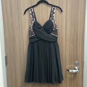 Nikibiki Black mini semi sequin dress.